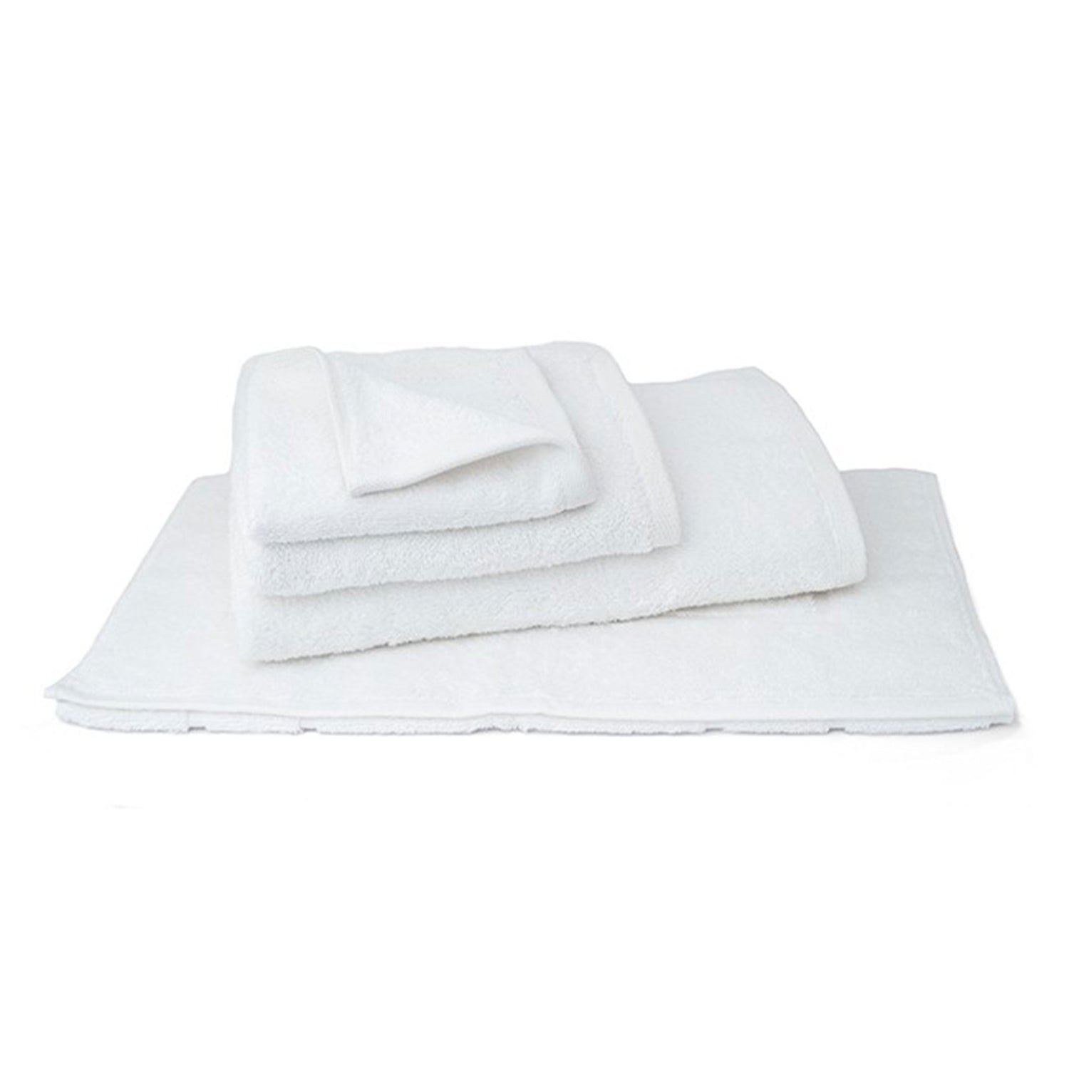Three folded white terry towels stacked on a folded white bath mat against a white background.