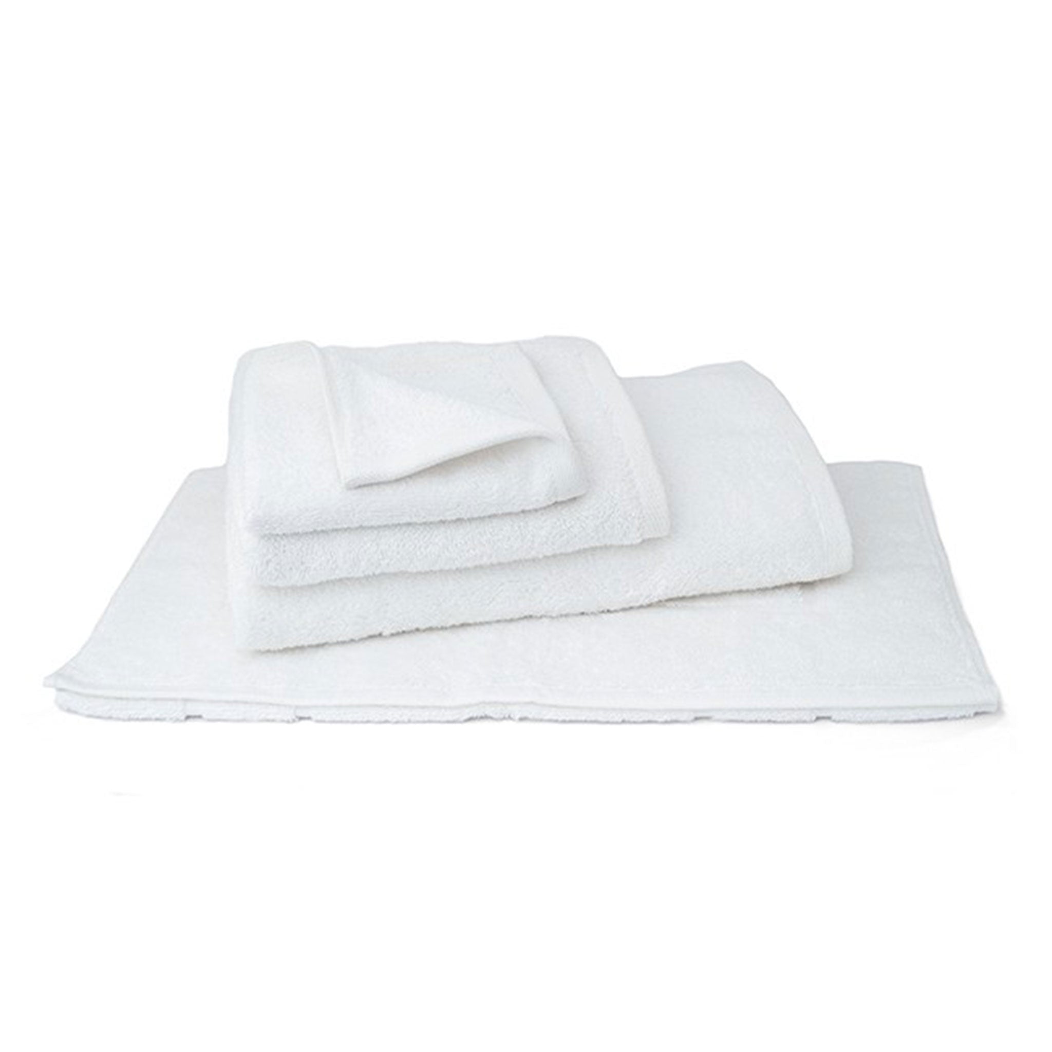 Three folded white terry towels stacked on a folded white bath mat against a white background.