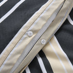 Close up of snap button closure on Brighton Stripe quilt cover