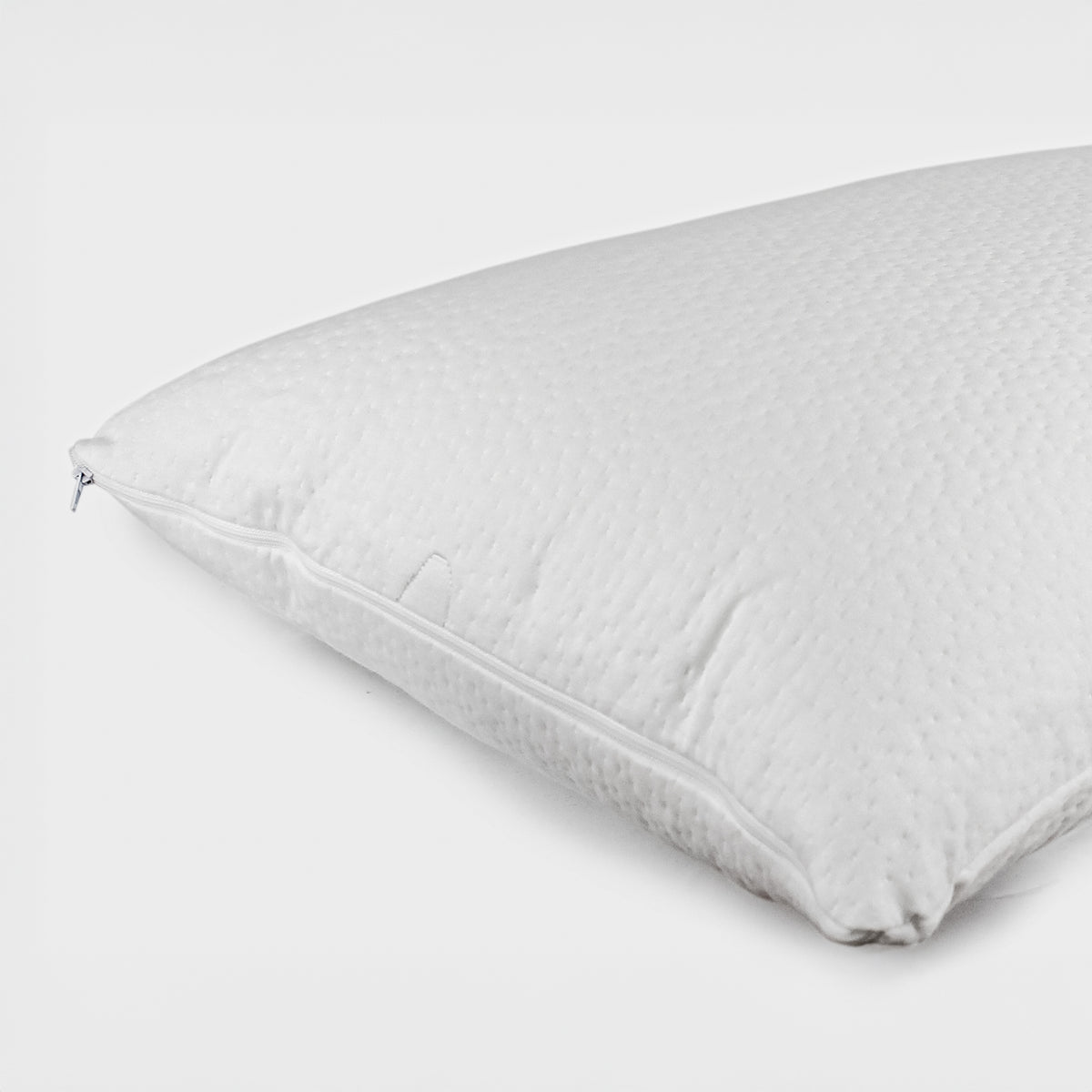 White CoolMax waterproof pillow protector with zip closure fitted over a pillow on a white background.