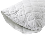 A white, Heavenly Dreams quilted envelope pillow protector.