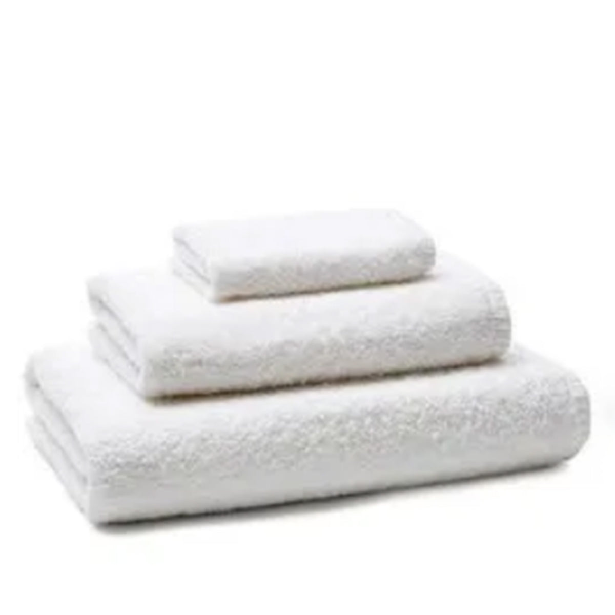 Stacked white terry towels in three sizes on a white background.