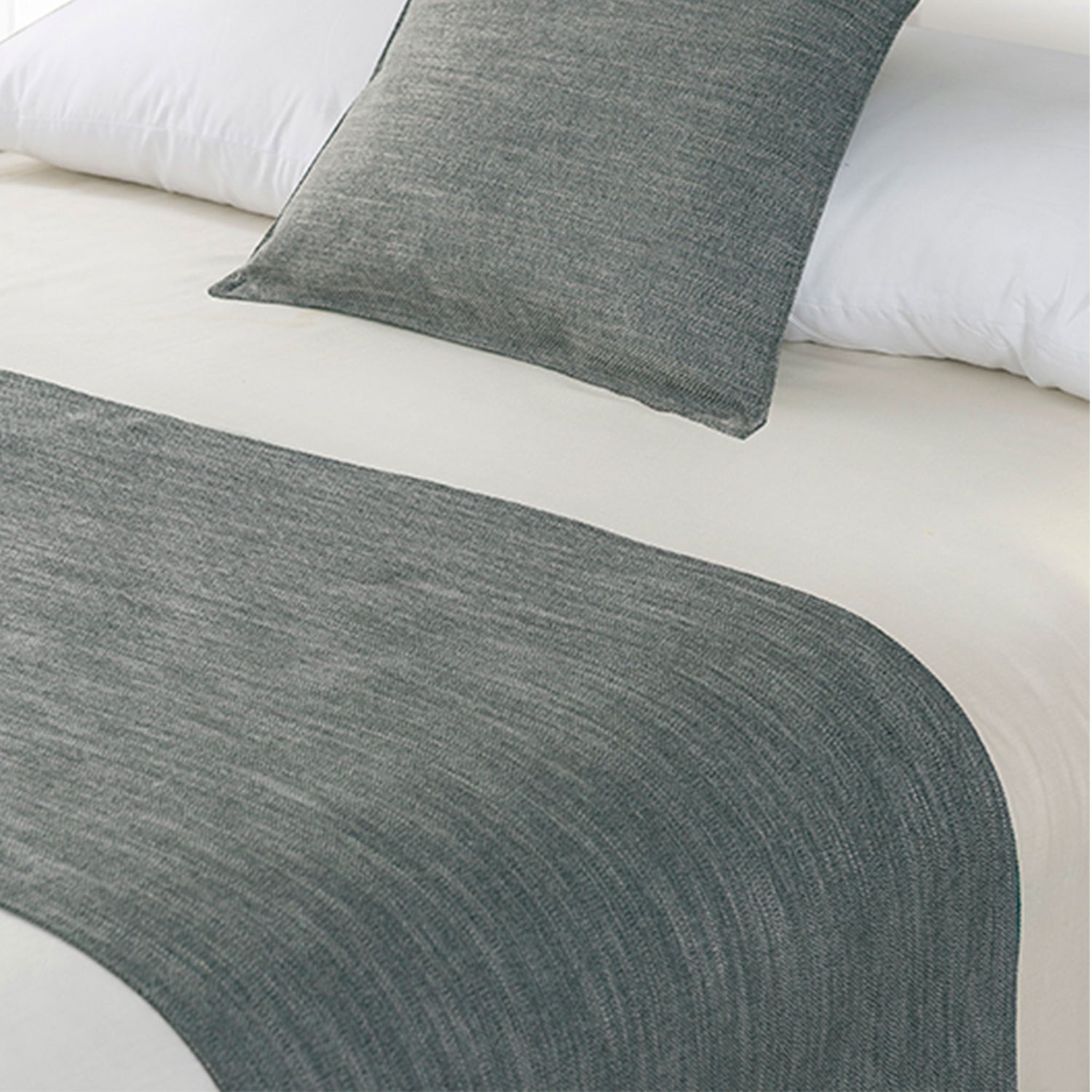 Pewter grey linen-look bed runner and matching cushion displayed on a bed with white bedding.