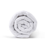 Rolled-up Repreve winter-weight quilt on a white background.