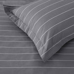Close up of Studio Stripe pillowcase corner in slate grey